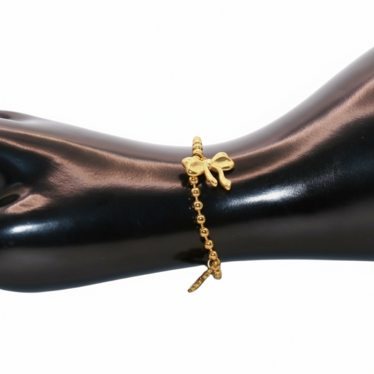 Gold Bracelet with bow and flower