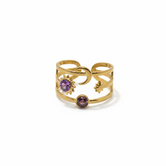 Gold ring with purple gemstone