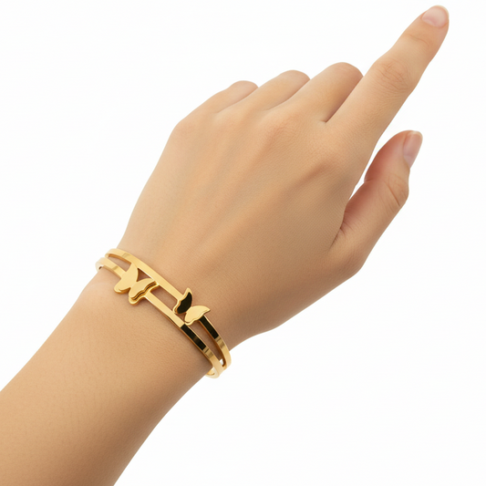 Gold bracelet with butterfly designs