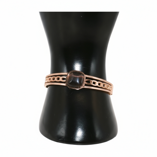 Bronze bracelet with a central stone