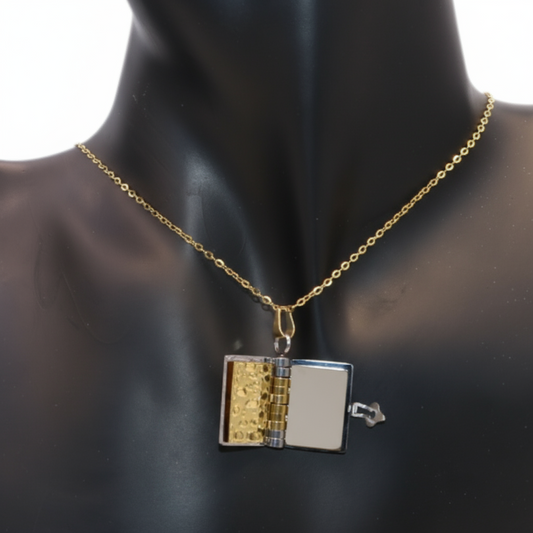 Gold necklace with a Book pendant