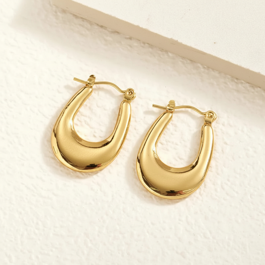 Gold chunky hoop earrings – text removed