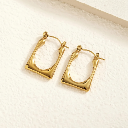 Gold rectangular hoop earrings – text removed