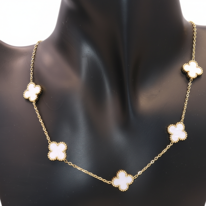 gold necklace with white clover
