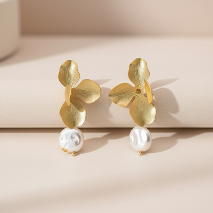 Gold butterfly earrings with white pearls 