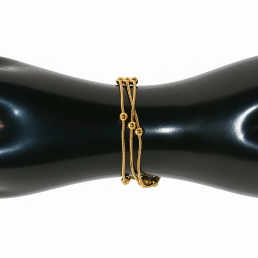 Gold bracelet with stones