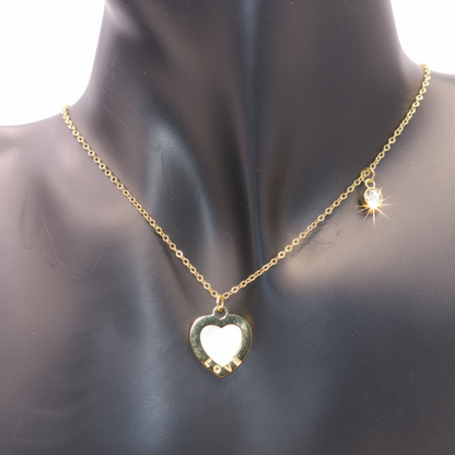 Gold necklace with a heart-shaped pendant 