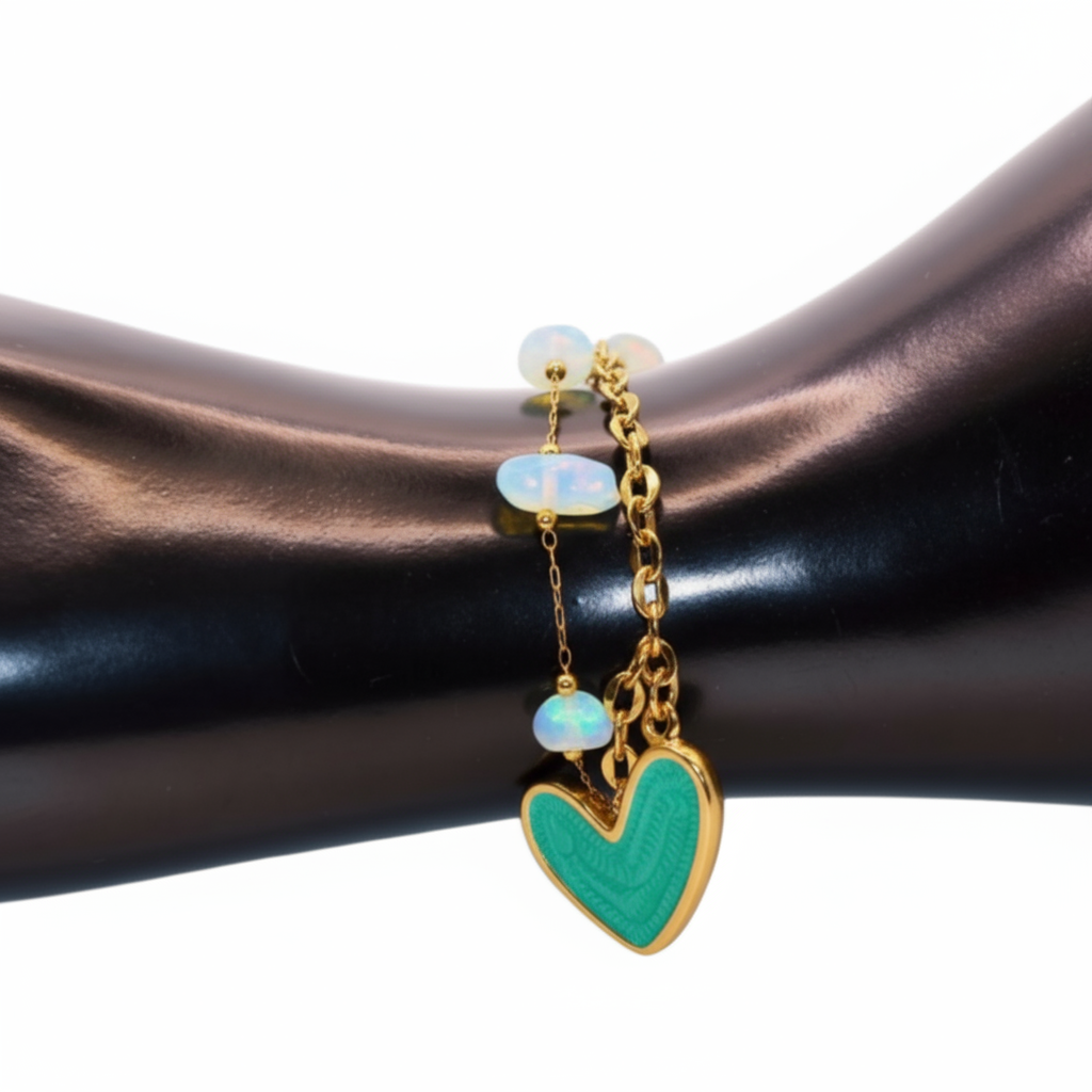 Bracelet with green heart charm and beads 