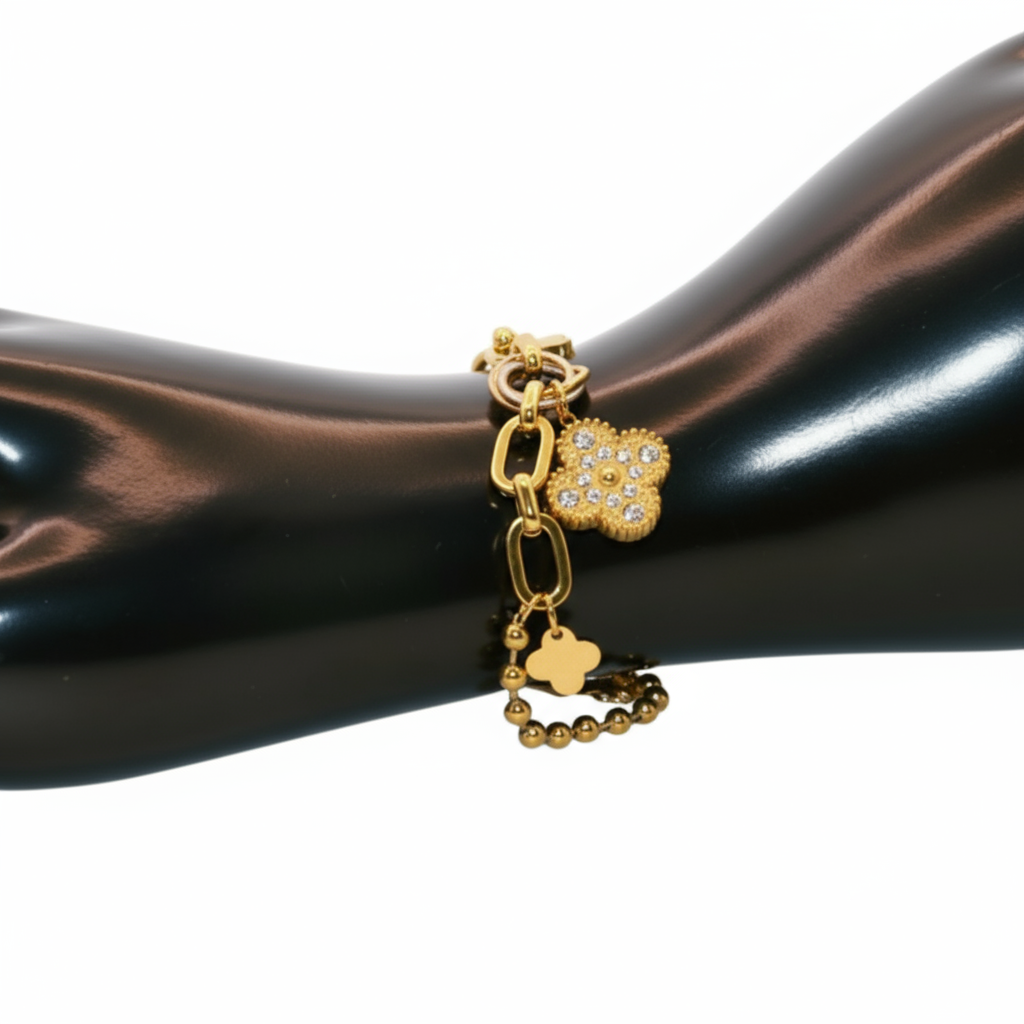 Gold bracelet with paw print charms 