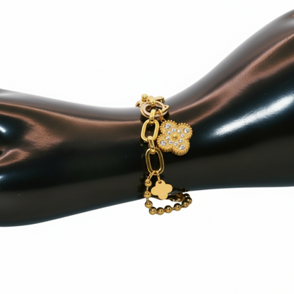 Gold bracelet with paw print charms 