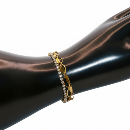 Gold bracelet with clear stones