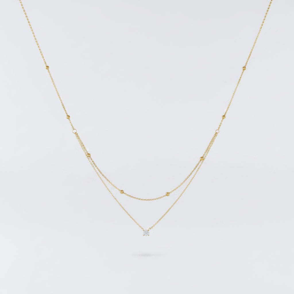 Gold necklace with stone
