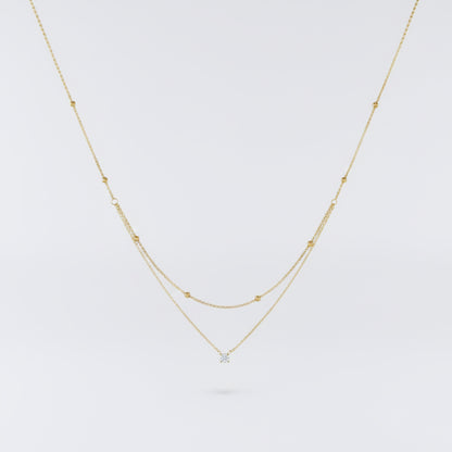 Gold necklace with stone
