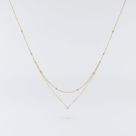 Gold necklace with stone
