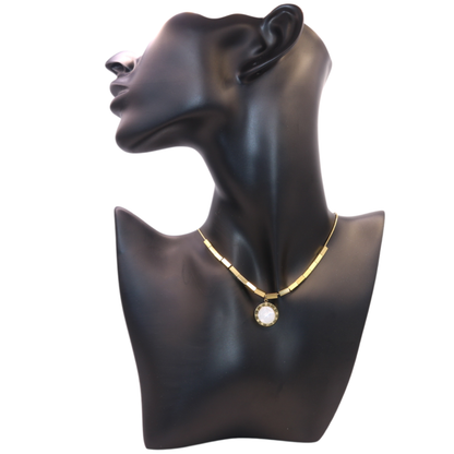 Gold necklace with white pendant