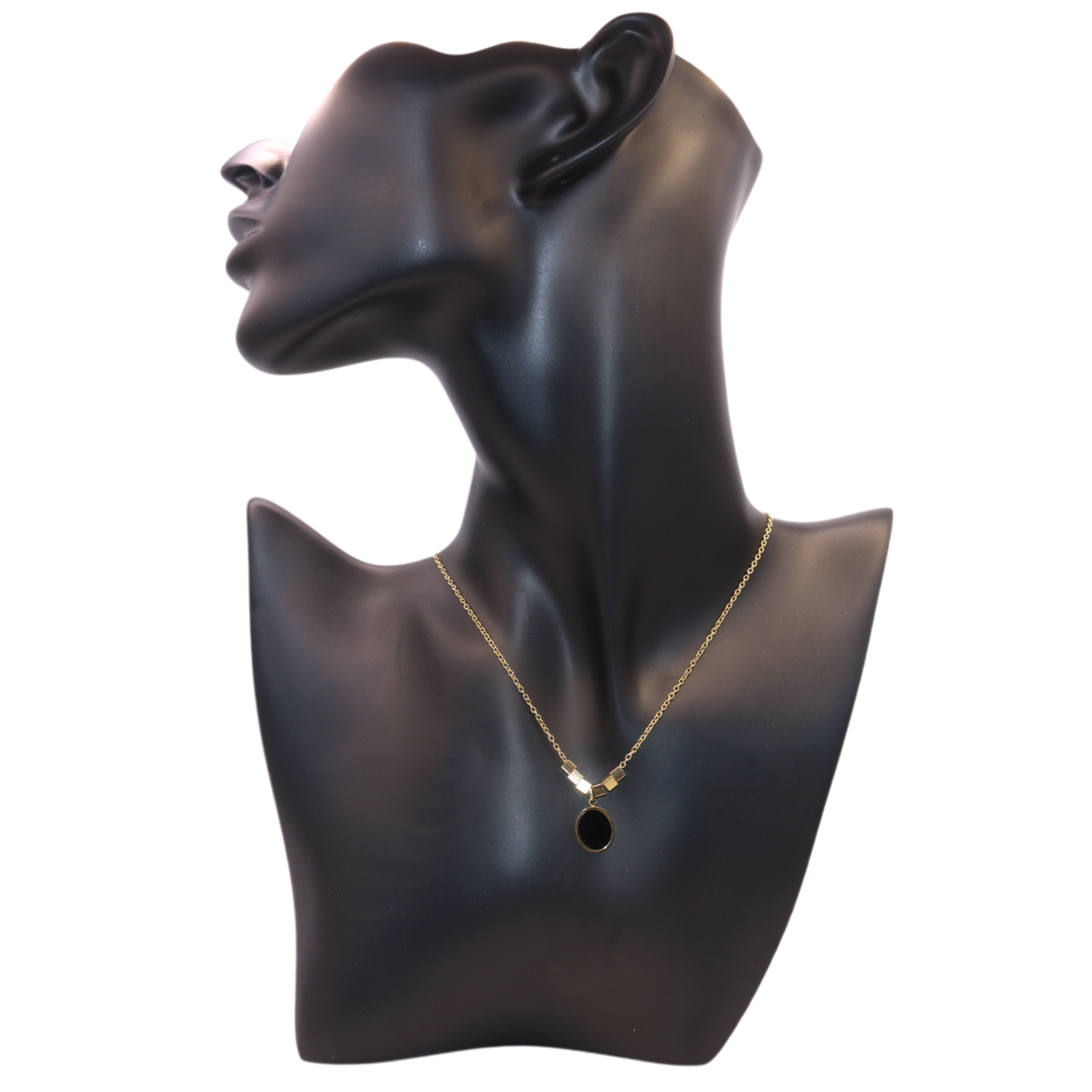 gold necklace with black oval pandant