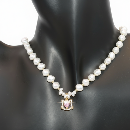 Pearl necklace with a pink heart pendant
