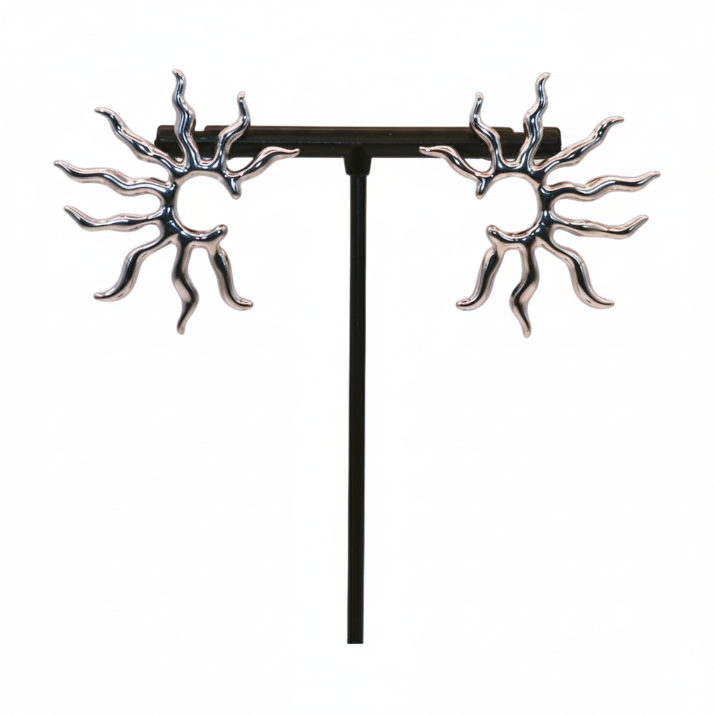 Pair of silver sun-shaped earrings 