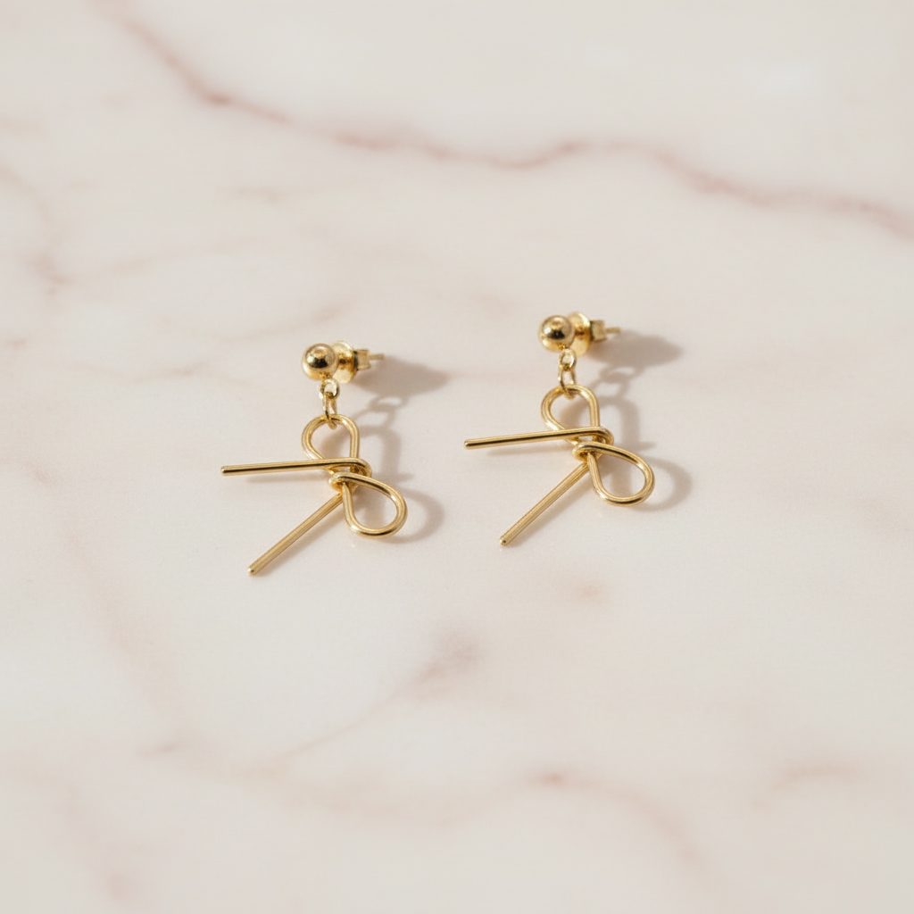 Gold bow-shaped earrings 