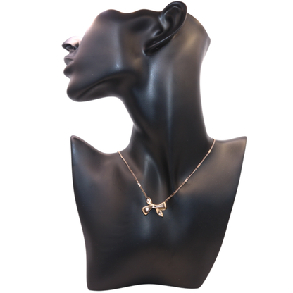Rose gold necklace with bow pendant
