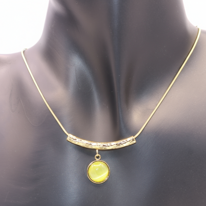 Gold necklace with a Green pendant