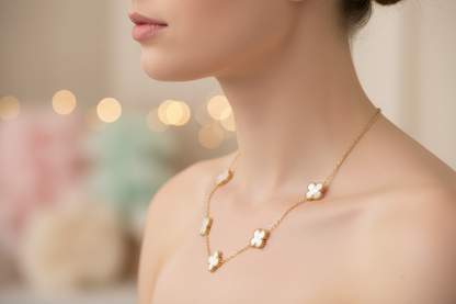 gold necklace with white clover